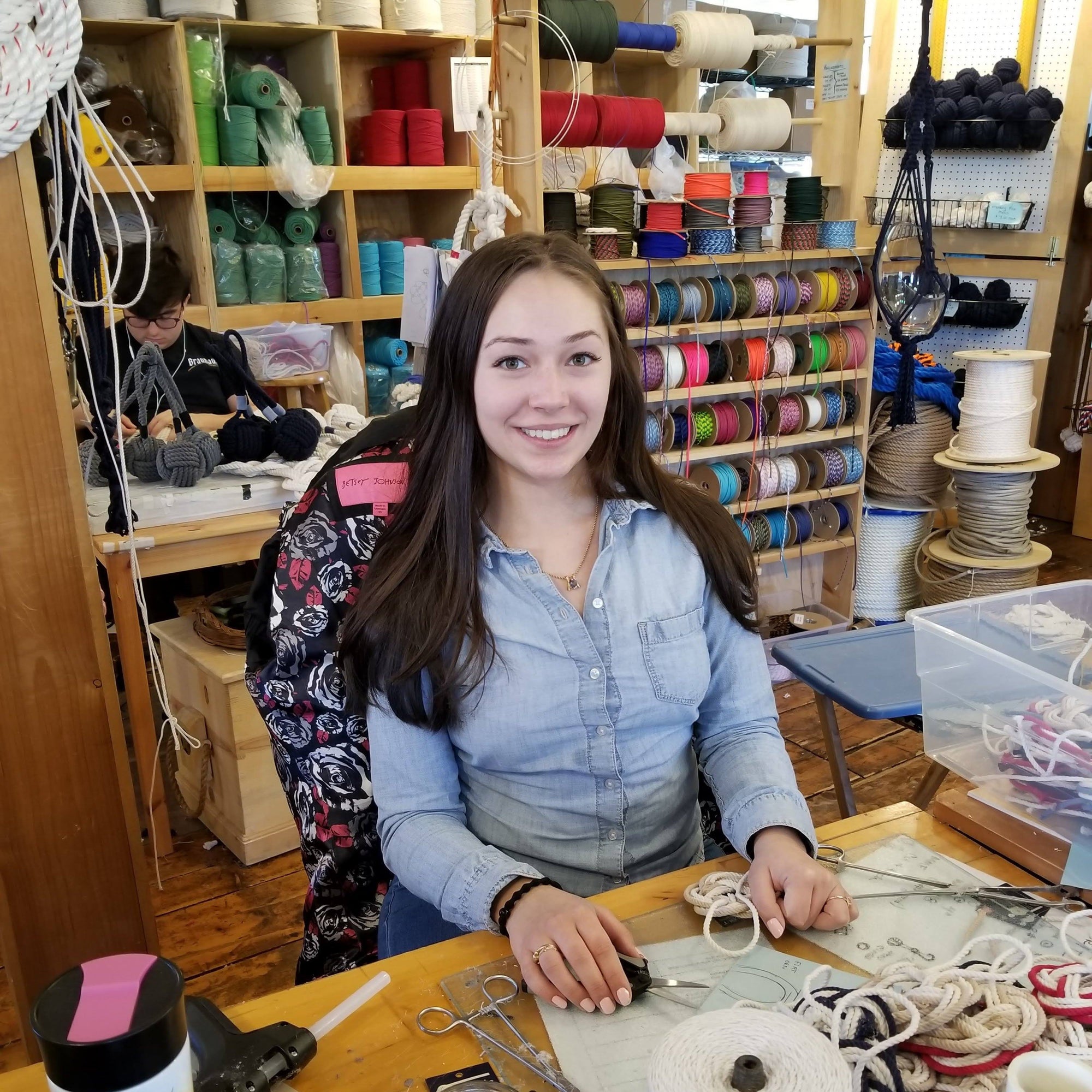 Lily, knot tying artisan at Mystic Knotwork, Mystic Connecticut