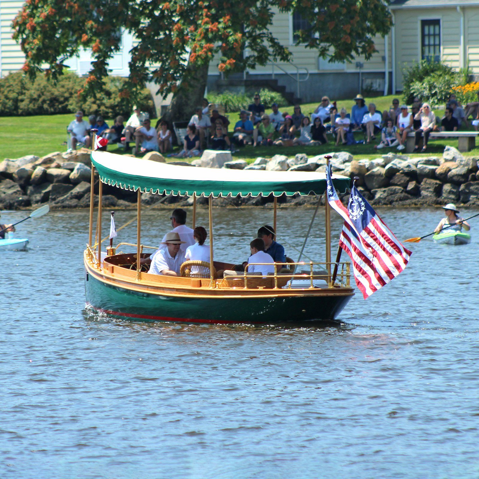 On The Shores of Mystic River, View The Antique Boat Parade